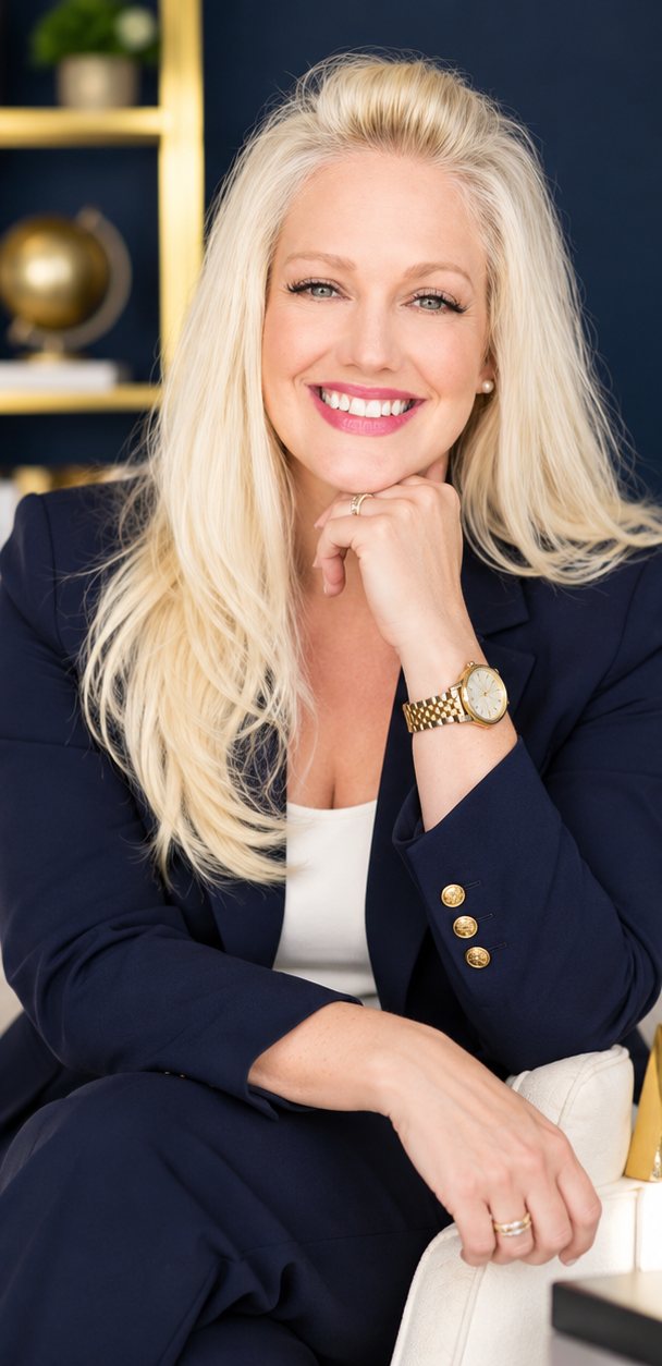 Portrait of Kelly A. Norton in a navy suit